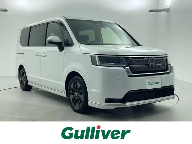ホンダ ステップワゴン スパーダ 福井県 2022(令4)年 2.6万km プラチナホワイトパール 車いす仕様車3列目乗車（スロープ）/ホンダセンシング/・衝突軽減ブレーキ/・車線逸脱警報機能/・クルーズコントロール（追従有）/純正ナビ/【AM/FM/CD/DVD/Bluetooth/フルセグTV】/バックカメラ/両側パワースライドドア/オートライト/LEDヘッドライド/プッシュスタート/スマートキー/パワーリアゲート/電動サイドブレーキ/ブレーキホールド機能