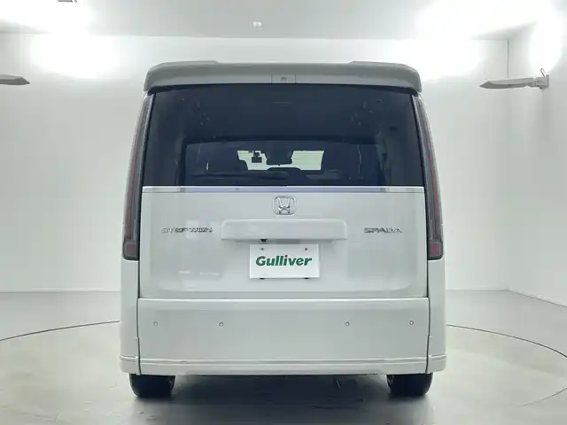 ホンダ ステップワゴン スパーダ 福井県 2022(令4)年 2.6万km プラチナホワイトパール 車いす仕様車3列目乗車（スロープ）/ホンダセンシング/・衝突軽減ブレーキ/・車線逸脱警報機能/・クルーズコントロール（追従有）/純正ナビ/【AM/FM/CD/DVD/Bluetooth/フルセグTV】/バックカメラ/両側パワースライドドア/オートライト/LEDヘッドライド/プッシュスタート/スマートキー/パワーリアゲート/電動サイドブレーキ/ブレーキホールド機能