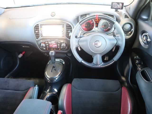 日産 ジューク ニスモ RS 愛知県 2015(平27)年 9.6万km ブリリアントホワイトパール ニスモ専用チューン/純正エアロパーツ/スマートキー×2プッシュスタート/アドバンレーシング18インチアルミホイール/（TC-4）/柿本改マフラー（純正有り）/BLITZ車校調（純正有り）/ニスモ専用シート・フロアマット・スカッフプレート/純正ナビ・フルセグTV・BLUETOOTHオーディオ・DVD・SD（MC314D-W）/バックカメラ/ETC/パドルシフト/純正ディスチャージヘッドライト/純正LEDアクセラリーライナー/オートライト/横滑防止装置/保証書・取扱説明書・ナビ取扱説明書・スペアキー/車検令和8年6月24日/走行距離95673km