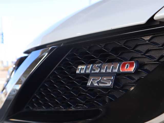 日産 ジューク ニスモ RS 愛知県 2015(平27)年 9.6万km ブリリアントホワイトパール ニスモ専用チューン/純正エアロパーツ/スマートキー×2プッシュスタート/アドバンレーシング18インチアルミホイール/（TC-4）/柿本改マフラー（純正有り）/BLITZ車校調（純正有り）/ニスモ専用シート・フロアマット・スカッフプレート/純正ナビ・フルセグTV・BLUETOOTHオーディオ・DVD・SD（MC314D-W）/バックカメラ/ETC/パドルシフト/純正ディスチャージヘッドライト/純正LEDアクセラリーライナー/オートライト/横滑防止装置/保証書・取扱説明書・ナビ取扱説明書・スペアキー/車検令和8年6月24日/走行距離95673km