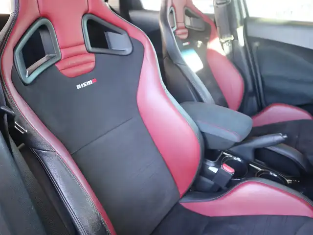 日産 ジューク ニスモ RS 愛知県 2015(平27)年 9.6万km ブリリアントホワイトパール ニスモ専用チューン/純正エアロパーツ/スマートキー×2プッシュスタート/アドバンレーシング18インチアルミホイール/（TC-4）/柿本改マフラー（純正有り）/BLITZ車校調（純正有り）/ニスモ専用シート・フロアマット・スカッフプレート/純正ナビ・フルセグTV・BLUETOOTHオーディオ・DVD・SD（MC314D-W）/バックカメラ/ETC/パドルシフト/純正ディスチャージヘッドライト/純正LEDアクセラリーライナー/オートライト/横滑防止装置/保証書・取扱説明書・ナビ取扱説明書・スペアキー/車検令和8年6月24日/走行距離95673km