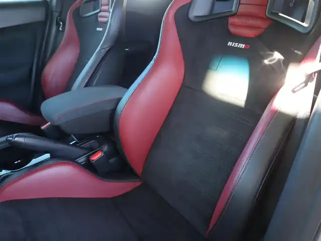 日産 ジューク ニスモ RS 愛知県 2015(平27)年 9.6万km ブリリアントホワイトパール ニスモ専用チューン/純正エアロパーツ/スマートキー×2プッシュスタート/アドバンレーシング18インチアルミホイール/（TC-4）/柿本改マフラー（純正有り）/BLITZ車校調（純正有り）/ニスモ専用シート・フロアマット・スカッフプレート/純正ナビ・フルセグTV・BLUETOOTHオーディオ・DVD・SD（MC314D-W）/バックカメラ/ETC/パドルシフト/純正ディスチャージヘッドライト/純正LEDアクセラリーライナー/オートライト/横滑防止装置/保証書・取扱説明書・ナビ取扱説明書・スペアキー/車検令和8年6月24日/走行距離95673km