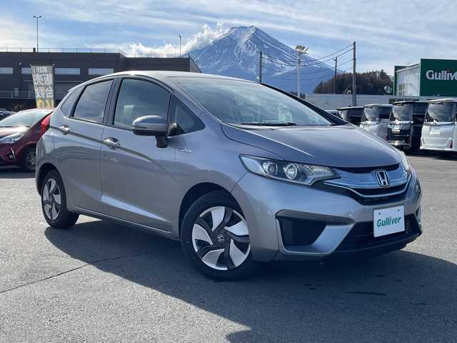 ホンダ フィット ハイブリット Fパッケージ 山梨県 2013(平25)年 4.7万km ティンテッドシルバーM 福祉車　/純正ＨＤＤナビ　/フルセグＴＶ　/バックカメラ　/純正ビルトインＥＴＣ　/Ｂｌｕｅｔｏｏｔｈ／ＵＳＢ　/ドラレコ　/純正フロアマット　/ＡＢＳ　/横滑り防止装置　/盗難防止装置　/オートライト　/Ｗエアバッグ