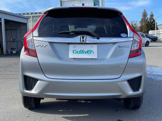 ホンダ フィット ハイブリット Fパッケージ 山梨県 2013(平25)年 4.7万km ティンテッドシルバーM 福祉車　/純正ＨＤＤナビ　/フルセグＴＶ　/バックカメラ　/純正ビルトインＥＴＣ　/Ｂｌｕｅｔｏｏｔｈ／ＵＳＢ　/ドラレコ　/純正フロアマット　/ＡＢＳ　/横滑り防止装置　/盗難防止装置　/オートライト　/Ｗエアバッグ