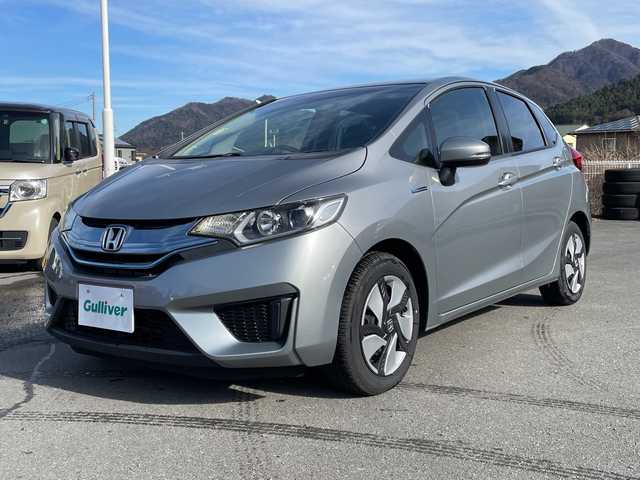 ホンダ フィット ハイブリット Fパッケージ 山梨県 2013(平25)年 4.7万km ティンテッドシルバーM 福祉車　/純正ＨＤＤナビ　/フルセグＴＶ　/バックカメラ　/純正ビルトインＥＴＣ　/Ｂｌｕｅｔｏｏｔｈ／ＵＳＢ　/ドラレコ　/純正フロアマット　/ＡＢＳ　/横滑り防止装置　/盗難防止装置　/オートライト　/Ｗエアバッグ