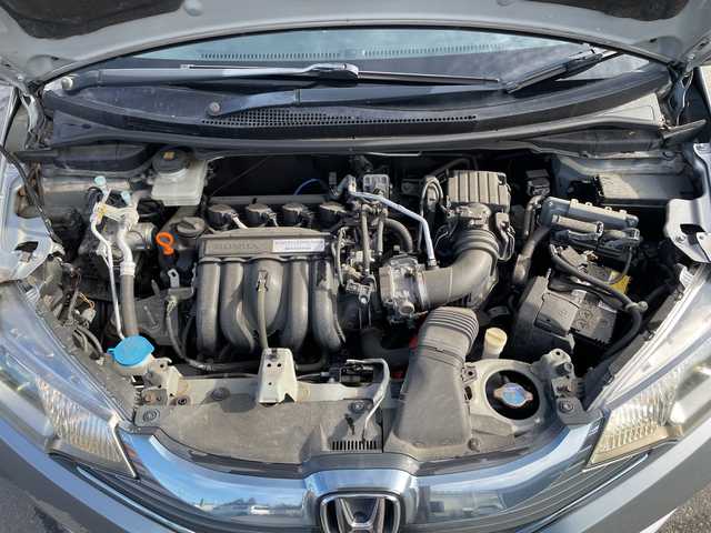 ホンダ フィット ハイブリット Fパッケージ 山梨県 2013(平25)年 4.7万km ティンテッドシルバーM 福祉車　/純正ＨＤＤナビ　/フルセグＴＶ　/バックカメラ　/純正ビルトインＥＴＣ　/Ｂｌｕｅｔｏｏｔｈ／ＵＳＢ　/ドラレコ　/純正フロアマット　/ＡＢＳ　/横滑り防止装置　/盗難防止装置　/オートライト　/Ｗエアバッグ