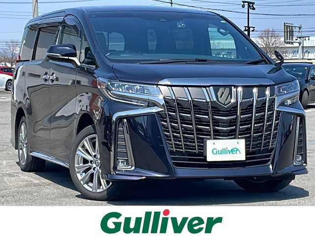 トヨタ アルファード S タイプゴールド 道央・札幌 2020(令2)年 5.6万km スパークリングブラックパールクリスタルシャイン ４WD/ワンオーナー/純正ディスプレイオーディオ/CD/DVD/BT/フルセグ/純正フリップダウンモニター/トヨタセーフティセンス/プリクラッシュセーフティ/横滑り防止装置/レーダークルーズコントロール/レーンキープアシスト/レーンキープアシスト/パーキングサポートブレーキ/ロードサインアシスト/バックカメラ/ビルトインETC/ドライブレコーダー/アイドリングストップ/ECOMODE/両側パワースライドドア/パワーバックドア/ハーフレザーシート/2列目オットマン/革巻きウッドコンビステアリング/ステアリングリモコン/AC100V/MTモード付AT/プッシュスタート/スマートキー/LEDヘッドライト/オートライト/オートハイビーム/フォグランプ/電動格納ミラー/ウィンカーミラー/純正フロアマット/ドアバイザー