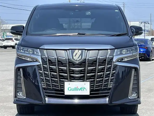 トヨタ アルファード S タイプゴールド 道央・札幌 2020(令2)年 5.6万km スパークリングブラックパールクリスタルシャイン ４WD/ワンオーナー/純正ディスプレイオーディオ/CD/DVD/BT/フルセグ/純正フリップダウンモニター/トヨタセーフティセンス/プリクラッシュセーフティ/横滑り防止装置/レーダークルーズコントロール/レーンキープアシスト/レーンキープアシスト/パーキングサポートブレーキ/ロードサインアシスト/バックカメラ/ビルトインETC/ドライブレコーダー/アイドリングストップ/ECOMODE/両側パワースライドドア/パワーバックドア/ハーフレザーシート/2列目オットマン/革巻きウッドコンビステアリング/ステアリングリモコン/AC100V/MTモード付AT/プッシュスタート/スマートキー/LEDヘッドライト/オートライト/オートハイビーム/フォグランプ/電動格納ミラー/ウィンカーミラー/純正フロアマット/ドアバイザー