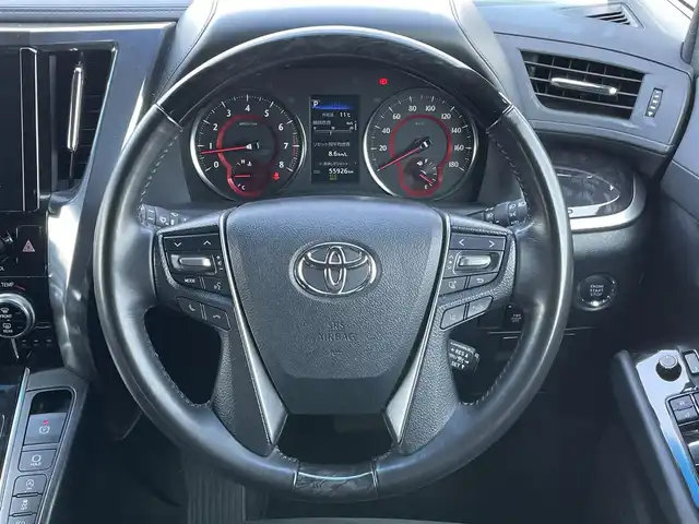 トヨタ アルファード S タイプゴールド 道央・札幌 2020(令2)年 5.6万km スパークリングブラックパールクリスタルシャイン ４WD/ワンオーナー/純正ディスプレイオーディオ/CD/DVD/BT/フルセグ/純正フリップダウンモニター/トヨタセーフティセンス/プリクラッシュセーフティ/横滑り防止装置/レーダークルーズコントロール/レーンキープアシスト/レーンキープアシスト/パーキングサポートブレーキ/ロードサインアシスト/バックカメラ/ビルトインETC/ドライブレコーダー/アイドリングストップ/ECOMODE/両側パワースライドドア/パワーバックドア/ハーフレザーシート/2列目オットマン/革巻きウッドコンビステアリング/ステアリングリモコン/AC100V/MTモード付AT/プッシュスタート/スマートキー/LEDヘッドライト/オートライト/オートハイビーム/フォグランプ/電動格納ミラー/ウィンカーミラー/純正フロアマット/ドアバイザー