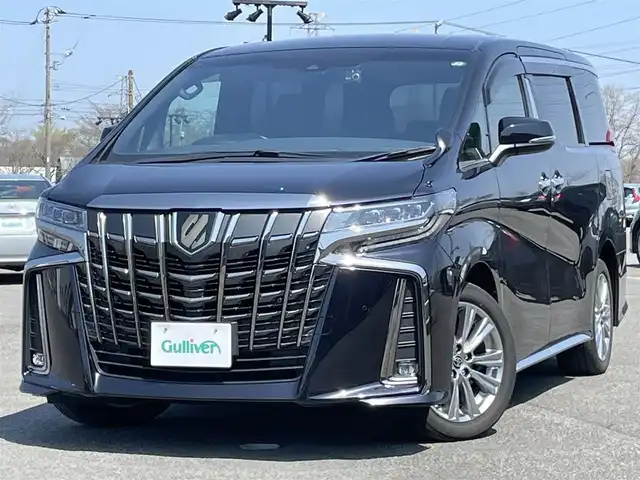 トヨタ アルファード S タイプゴールド 道央・札幌 2020(令2)年 5.6万km スパークリングブラックパールクリスタルシャイン ４WD/ワンオーナー/純正ディスプレイオーディオ/CD/DVD/BT/フルセグ/純正フリップダウンモニター/トヨタセーフティセンス/プリクラッシュセーフティ/横滑り防止装置/レーダークルーズコントロール/レーンキープアシスト/レーンキープアシスト/パーキングサポートブレーキ/ロードサインアシスト/バックカメラ/ビルトインETC/ドライブレコーダー/アイドリングストップ/ECOMODE/両側パワースライドドア/パワーバックドア/ハーフレザーシート/2列目オットマン/革巻きウッドコンビステアリング/ステアリングリモコン/AC100V/MTモード付AT/プッシュスタート/スマートキー/LEDヘッドライト/オートライト/オートハイビーム/フォグランプ/電動格納ミラー/ウィンカーミラー/純正フロアマット/ドアバイザー