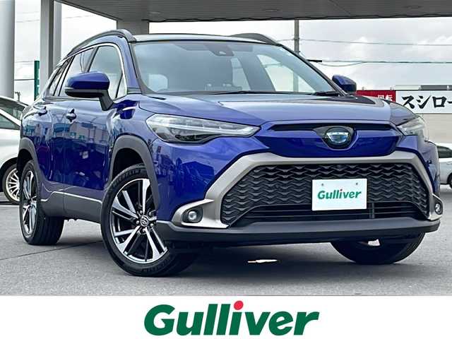 トヨタ カローラ クロス ハイブリッド Z 道北・旭川 2022(令4)年 2.4万km ダークブルーマイカM ・禁煙車/・４WD/・純正ディスプレイオーディオナビ/BT/USB/・パノラミックビューモニター/・ハンズフリーパワーバックドア/・オートライト/・オートマチックハイビーム/・ハーフレザーシート/・プリクラッシュブレーキ/・レーダークルーズコントロール/・レーンキープアシスト/・前席シートヒーター/・パワーシート/・LEDヘッドライト/フォグランプ/・ミラーヒーター/・革巻きステアリング/・ステアリングスイッチ/・ETC/・純正ゴムマット/・ウィンカーミラー/・１００V電源
