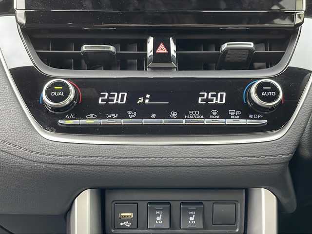 トヨタ カローラ クロス ハイブリッド Z 道北・旭川 2022(令4)年 2.4万km ダークブルーマイカM ・禁煙車/・４WD/・純正ディスプレイオーディオナビ/BT/USB/・パノラミックビューモニター/・ハンズフリーパワーバックドア/・オートライト/・オートマチックハイビーム/・ハーフレザーシート/・プリクラッシュブレーキ/・レーダークルーズコントロール/・レーンキープアシスト/・前席シートヒーター/・パワーシート/・LEDヘッドライト/フォグランプ/・ミラーヒーター/・革巻きステアリング/・ステアリングスイッチ/・ETC/・純正ゴムマット/・ウィンカーミラー/・１００V電源