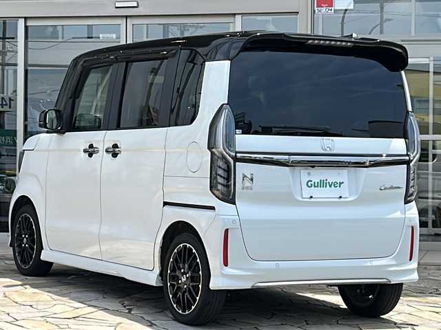 ホンダ Ｎ ＢＯＸ カスタム L ターボ コーディネートスタイル 静岡県 2022(令4)年 3.4万km プラチナホワイトパール ホンダセンシング/・衝突軽減ブレーキ/・アクティブクルーズコントロール/・レーンキープアシスト/・ロードサインアシスト/純正ナビ/・フルセグTV/・CD/DVD/MSV/ラジオ/Bluetooth/HDMI/主要装備/・ETC/・両側パワースライドドア/・レザーシート/・シートヒーター/・プッシュスタート/・スマートキー/・ブレーキホールド/・コーナーセンサー
