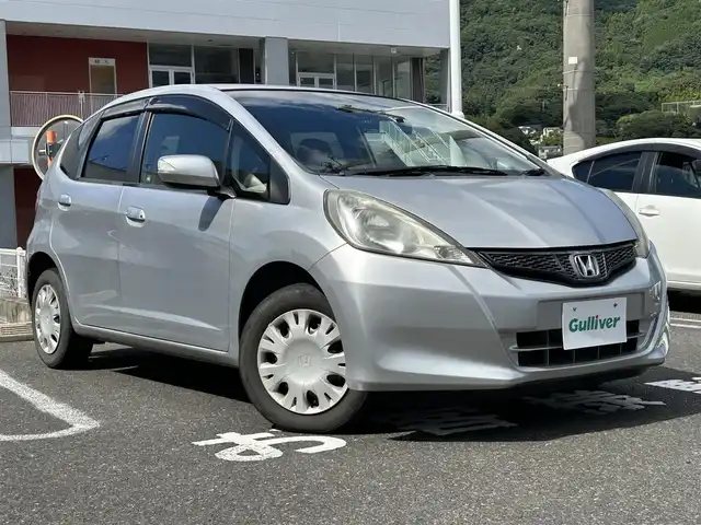 ホンダ フィット G スマートセレクション 長崎県 2012(平24)年 10.7万km アラバスターシルバーメタリック 純正HDDナビ/・AM/FM/フルセグTV/バックカメラ/ビルトインETC/ライトレベライザー/ステアリングスイッチ/前後ドライブレコーダー/フロアマット/ドアバイザー/電動格納ウィンカーミラー/保証書/取扱説明書/ナビ取扱説明書