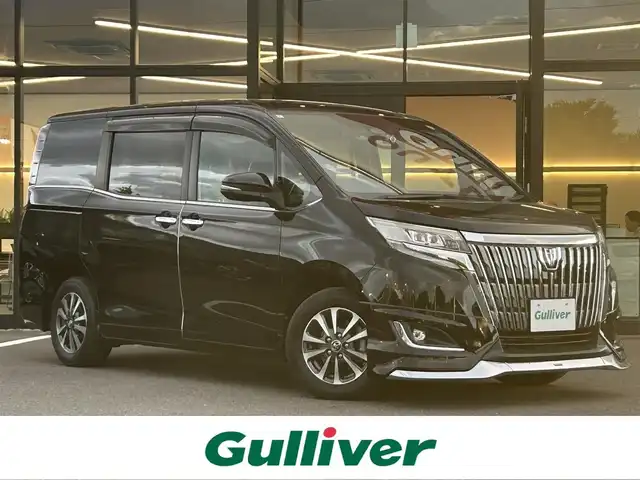 トヨタ エスクァイア Gi プレミアムパッケージ 栃木県 2018(平30)年 2.2万km ブラック トヨタセーフティセンス/モデリスタエアロ/純正9インチナビ/フルセグTV/DVD/Bluetooth/MSV/バックカメラ/ETC/両側パワースライドドア/ブラウンハーフレザーシート/シートヒーター/ステアリングリモコン/ステアリングヒーター/クルーズコントロール/LEDヘッドライト/オートハイビーム/シートバックテーブル/ロールサンシェード/スマートキー