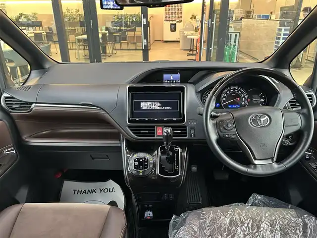 トヨタ エスクァイア Gi プレミアムパッケージ 栃木県 2018(平30)年 2.2万km ブラック トヨタセーフティセンス/モデリスタエアロ/純正9インチナビ/フルセグTV/DVD/Bluetooth/MSV/バックカメラ/ETC/両側パワースライドドア/ブラウンハーフレザーシート/シートヒーター/ステアリングリモコン/ステアリングヒーター/クルーズコントロール/LEDヘッドライト/オートハイビーム/シートバックテーブル/ロールサンシェード/スマートキー