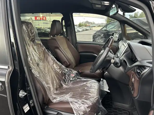 トヨタ エスクァイア Gi プレミアムパッケージ 栃木県 2018(平30)年 2.2万km ブラック トヨタセーフティセンス/モデリスタエアロ/純正9インチナビ/フルセグTV/DVD/Bluetooth/MSV/バックカメラ/ETC/両側パワースライドドア/ブラウンハーフレザーシート/シートヒーター/ステアリングリモコン/ステアリングヒーター/クルーズコントロール/LEDヘッドライト/オートハイビーム/シートバックテーブル/ロールサンシェード/スマートキー
