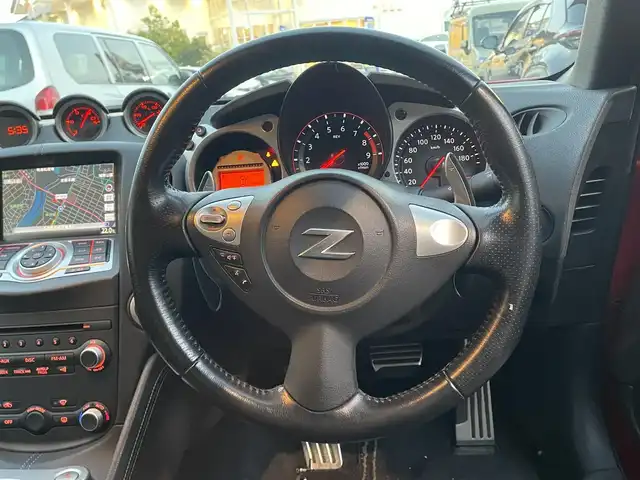 日産 フェアレディ Ｚ バージョンT 愛知県 2011(平23)年 12.5万km バイブラントレッド (株)IDOMが運営する【じしゃロン名古屋鳴海店】の自社ローン専用車両になりますこちらは現金またはオートローンご利用時の価格です。自社ローンご希望の方は別途その旨お申付け下さい/プッシュスタート/フルセグテレビ/バックカメラ/クルーズコントロール/純正ナビ/ワンオーナー/パドルシフト