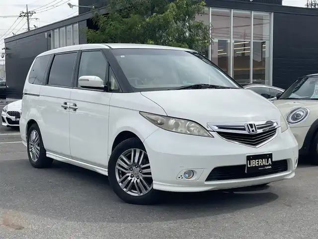 ホンダ エリシオン G プレミアム 埼玉県 2005(平17)年 10.1万km ブルーイッシュホワイトパール 両側パワースライドドア/純正フリップダウンモニター/ウッド調パネル/ウッドレザーコンビステア/社外ＥＴＣ/ダブルエアバッグ/アンチロックブレーキ