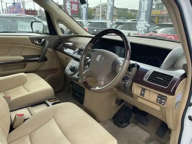 ホンダ エリシオン G プレミアム 埼玉県 2005(平17)年 10.1万km ブルーイッシュホワイトパール 両側パワースライドドア/純正フリップダウンモニター/ウッド調パネル/ウッドレザーコンビステア/社外ＥＴＣ/ダブルエアバッグ/アンチロックブレーキ