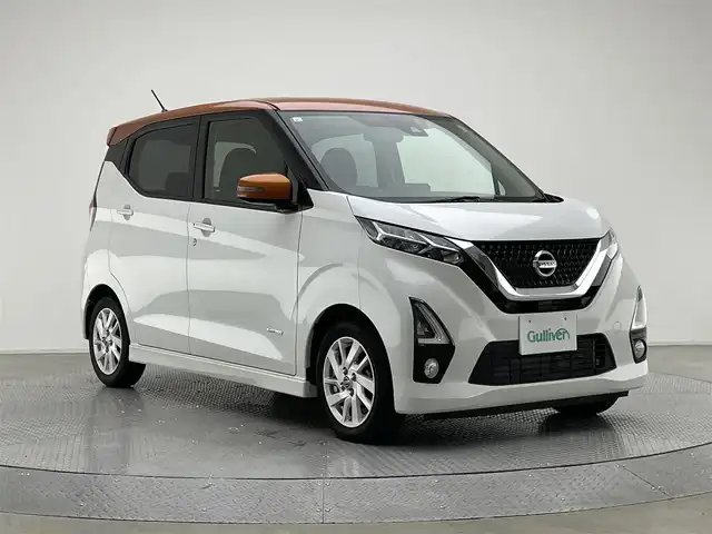 日産 デイズ ハイウェイスターX 兵庫県 2019(令1)年 1.8万km プレミアムサンシャインオレンジメタリック/シルキーホワイト ・純正SDナビ/（CD、DVD、フルセグ、Bluetooth）/・アラウンドビューモニター/・前後コーナーセンサー/・レーンキープアシスト/・LEDヘッドライト/・オートライト/・純正14インチアルミホイール/・純正フロアマット/・スマートキー/・スペアキー