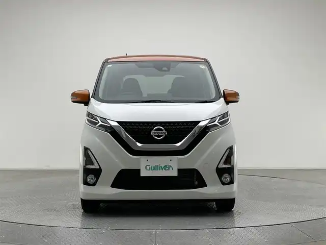 日産 デイズ ハイウェイスターX 兵庫県 2019(令1)年 1.8万km プレミアムサンシャインオレンジメタリック/シルキーホワイト ・純正SDナビ/（CD、DVD、フルセグ、Bluetooth）/・アラウンドビューモニター/・前後コーナーセンサー/・レーンキープアシスト/・LEDヘッドライト/・オートライト/・純正14インチアルミホイール/・純正フロアマット/・スマートキー/・スペアキー