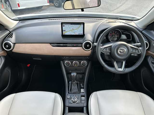 マツダ ＣＸ－３ 15S アーバンドレッサー 沖縄県 2023(令5)年 1.5万km スノーフレイクホワイトパールマイカ 純正ナビ・TV・Bluetooth・CD/DVD/全方位カメラ/前後ドラレコ　/コーナーセンサー/オートライト/シートヒーター・ハンドルヒーター/スマートブレーキサポート/追従機能付きレーダークルーズコントロール/BSM/レーンキープアシスト/誤発進抑制制御