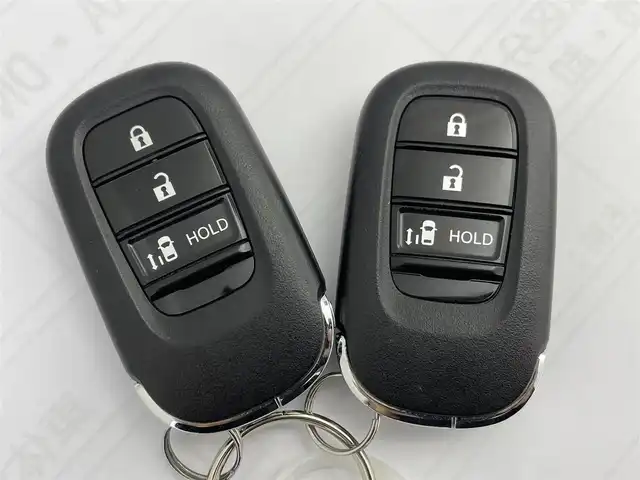 ホンダ Ｎ ＢＯＸ カスタム 群馬県 2023(令5)年 0.7万km メテオロイドグレーメタリック 純正９インチナビ　バックカメラ　アダプティブクルーズコントロール　片側パワースライドドア　ＬＥＤ　ＡＨＢ　シートヒーター　純正１４インチＡＷ　ステアリングリモコン　ＥＴＣ　スマートキー　禁煙車
