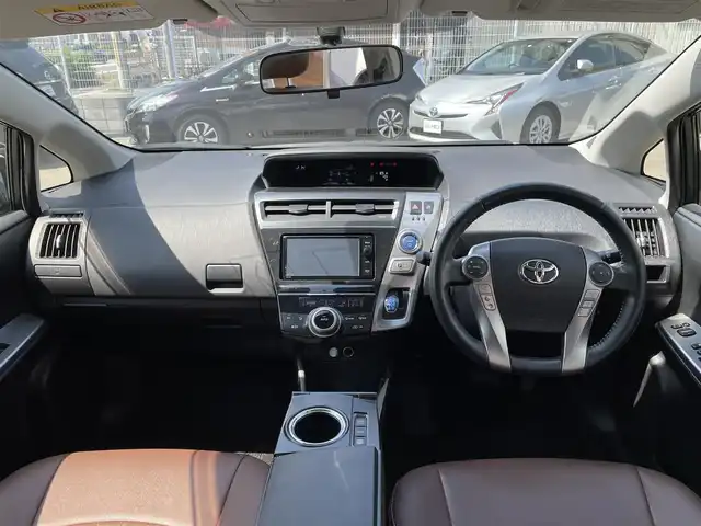 トヨタ プリウス α S ツーリングセレクション 大阪府 2015(平27)年 11.2万km ホワイトパールクリスタルシャイン (株)IDOMが運営する【じしゃロン東大阪店】の自社ローン専用車両になります。こちらは現金またはオートローンご利用時の価格です。自社ローンご希望の方は別途その旨お申付け下さい/後期型5人乗り/純正メモリーナビ【NSZN-W64T】/バックカメラ/スマートキー＆プッシュスタート/ETC/LEDライト/純正17インチアルミ/革調シートカバー