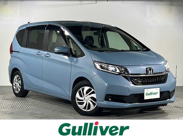 ホンダ フリード G ホンダセンシング 沖縄県 2020(令2)年 1.5万km シーグラスブルーパール 禁煙車/県外仕入れ/両側パワースライド/純正ナビVXM-204VFi/（ＣＤ　ＤＶＤ　ワンセグＴＶ　Ｂｌｕｅｔｏｏｔｈ）/ＬＥＤヘッドライト/バックカメラ/ビルトインＥＴＣ/純正ドライブレコーダー前後/後席サンシェード/６名乗り/スマートキー/プッシュスタート