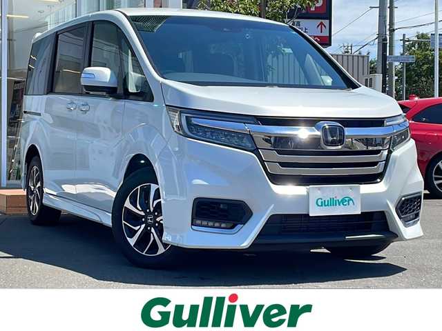 ホンダ ステップワゴン スパーダ ホンダセンシング 道央・札幌 2017(平29)年 8.9万km プラチナホワイトパール ・４WD/・Gathers SDナビ・CD・DVD・SD・Bluetooth/・フルセグTV/・バックカメラ/・衝突軽減ブレーキ/・レーンキープアシスト/・レーダークルーズ/・両側パワースライドドア/・後席モニター/・純正エンジンスターター/・ビルトインETC/・前後ドライブレコーダー/・パドルシフト/・LEDヘッドライト/・フォグランプ/・寒冷地仕様/・横滑り防止/・ウインカーミラー/・スマートキー/・純正１６インチアルミホイール/・純正フロアマット/・取扱説明書/・スペアキー
