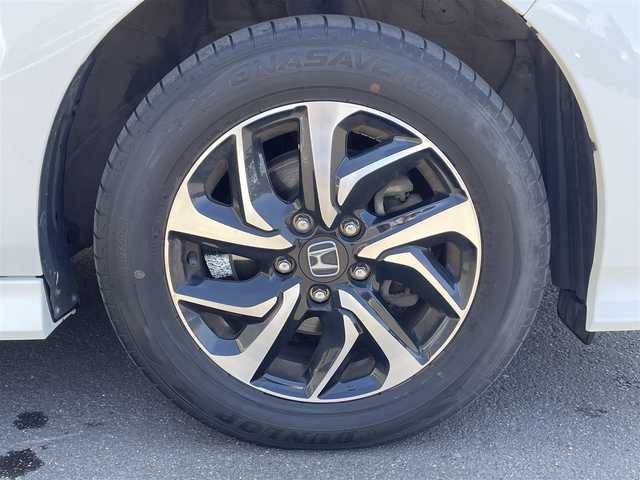 ホンダ ステップワゴン スパーダ ホンダセンシング 道央・札幌 2017(平29)年 8.9万km プラチナホワイトパール ・４WD/・Gathers SDナビ・CD・DVD・SD・Bluetooth/・フルセグTV/・バックカメラ/・衝突軽減ブレーキ/・レーンキープアシスト/・レーダークルーズ/・両側パワースライドドア/・後席モニター/・純正エンジンスターター/・ビルトインETC/・前後ドライブレコーダー/・パドルシフト/・LEDヘッドライト/・フォグランプ/・寒冷地仕様/・横滑り防止/・ウインカーミラー/・スマートキー/・純正１６インチアルミホイール/・純正フロアマット/・取扱説明書/・スペアキー
