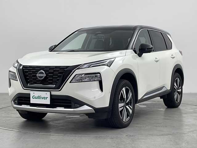 日産 エクストレイル G e－4ORCE 群馬県 2024(令6)年 0.9万km ブリリアントホワイトパール/スーパーブラック 2トーン 純正１２．３型ナビ　全周囲カメラ　ビルトインＥＴＣ２．０　前後ドラレコ　デジタルインナーミラー　レザーシート　パワーシート　シートヒーター　電動リアゲート　アダプティブクルーズコントロール　禁煙車
