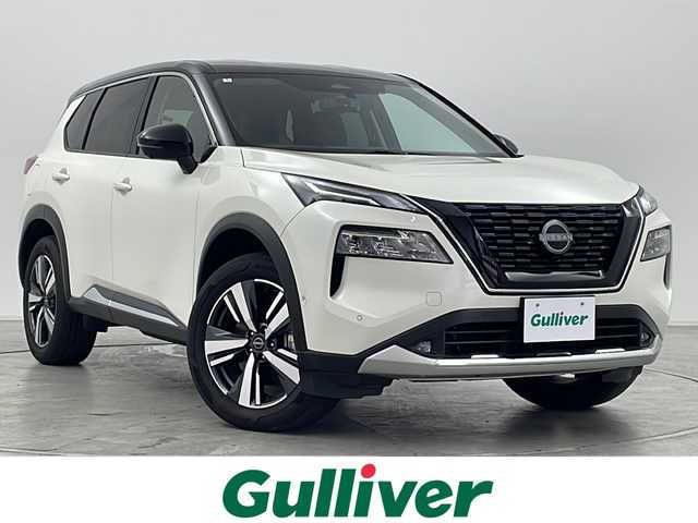 日産 エクストレイル G e－4ORCE 群馬県 2024(令6)年 0.9万km ブリリアントホワイトパール/スーパーブラック 2トーン 純正１２．３型ナビ　全周囲カメラ　ビルトインＥＴＣ２．０　前後ドラレコ　デジタルインナーミラー　レザーシート　パワーシート　シートヒーター　電動リアゲート　アダプティブクルーズコントロール　禁煙車