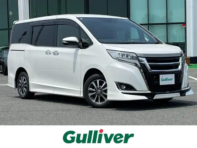 トヨタ エスクァイア Gi プレミアムパッケージ ブラックテーラード 奈良県 2020(令2)年 4.7万km ホワイトパールクリスタルシャイン 純正９インチナビ　/フルセグＴＶ　/BT/CD/DVD/SD/フリップダウンモニター　/両側パワースライドドア　/バックカメラ　/ＴＲＤフルエアロ/クルーズコントロール　/ハーフレザーシート　/シートヒーター　/衝突被害軽減システム　/スマートキー/ステアリングヒーター/ビルトインETC/純正15インチアルミホイール/フロアマット/前後コーナーセンサー/レーンキープアシスト