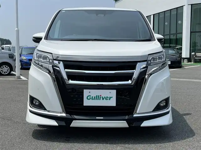 トヨタ エスクァイア Gi プレミアムパッケージ ブラックテーラード 奈良県 2020(令2)年 4.7万km ホワイトパールクリスタルシャイン 純正９インチナビ　/フルセグＴＶ　/BT/CD/DVD/SD/フリップダウンモニター　/両側パワースライドドア　/バックカメラ　/ＴＲＤフルエアロ/クルーズコントロール　/ハーフレザーシート　/シートヒーター　/衝突被害軽減システム　/スマートキー/ステアリングヒーター/ビルトインETC/純正15インチアルミホイール/フロアマット/前後コーナーセンサー/レーンキープアシスト