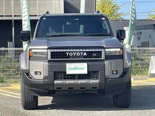 トヨタ ランドクルーザー ２５０ VX 宮城県 2025(令7)年 0.3万km アバンギャルドブロンズメタリック ワンオーナー/純正ナビ/(AM、FM、BT、フルセグTV)/サンルーフ/ルーフレール/スペアキー/純正アルミホイール/３列シート/レーダークルーズコントロール/パノラマビューモニター/バックカメラ/デジタルインナーミラー/ＥＴＣ２．０/フルレザーシート/パワーバックドア/ラバーマット/デフォッガー/オートライト/プリクラッシュセーフティ/パーキングホールド/プッシュスタートボタン/HDMI端子/Cポート/D、N席シートヒーター/クーラー/D席パワーシート/ヒートデアイサー/ステップ