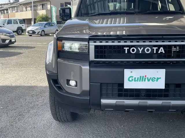 トヨタ ランドクルーザー ２５０ VX 宮城県 2025(令7)年 0.3万km アバンギャルドブロンズメタリック ワンオーナー/純正ナビ/(AM、FM、BT、フルセグTV)/サンルーフ/ルーフレール/スペアキー/純正アルミホイール/３列シート/レーダークルーズコントロール/パノラマビューモニター/バックカメラ/デジタルインナーミラー/ＥＴＣ２．０/フルレザーシート/パワーバックドア/ラバーマット/デフォッガー/オートライト/プリクラッシュセーフティ/パーキングホールド/プッシュスタートボタン/HDMI端子/Cポート/D、N席シートヒーター/クーラー/D席パワーシート/ヒートデアイサー/ステップ