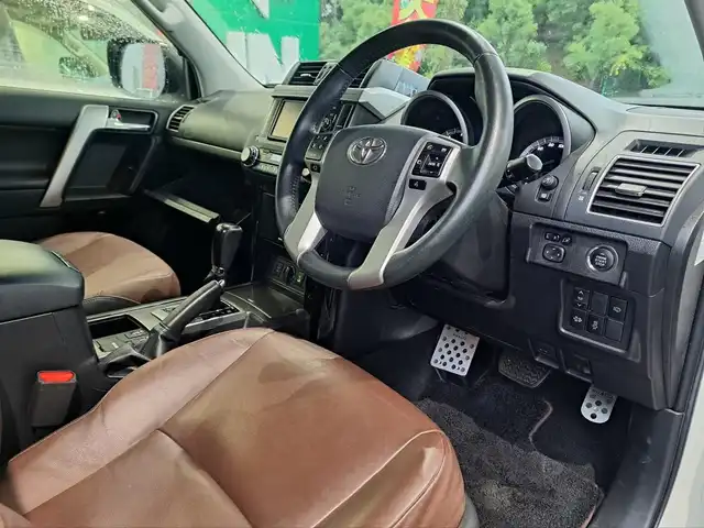 トヨタ ランドクルーザー プラド TX Lパッケージ・G－フロンティア 大阪府 2016(平28)年 8.9万km ホワイトパールクリスタルシャイン /禁煙車//ワンオーナー//MODELLISTAエアロ（フロント・リア）//サンルーフ/ルーフレール//LEDヘッドライト//ディーラー純正SDナビ/NSZT-W66T//Bluetooth/CD/DVD/SD/フルTV//バックカメラ//クルーズコントロール//前後コーナーセンサー//ビルトインETC//社外17インチアルミホイール/XTREME-J//茶革シート//前席パワーシート/シートヒーター//純正フロアマット//取説・保証書