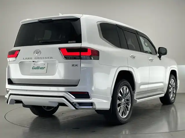トヨタ ランドクルーザー ZX 愛知県 2024(令6)年 0.1千km プレシャスホワイトパール 純正１２．３型ナビ　ムーンルーフ　モデリスタ　禁煙　ＪＢＬサウンド　ベージュ革　全方位カメラ　シートヒーター　ハンドルヒーター　ハンズフリー電動リアゲート　衝突軽減　追従クルコン　ＢＳＭ　ＨＵＤ　コーナーセンサー　サイドステップ　スマートエントリーシステム　マルチテレーンモニター　　プリクラッシュセーフティ　Tコネクトナビシステムオプション　TVキャンセラー