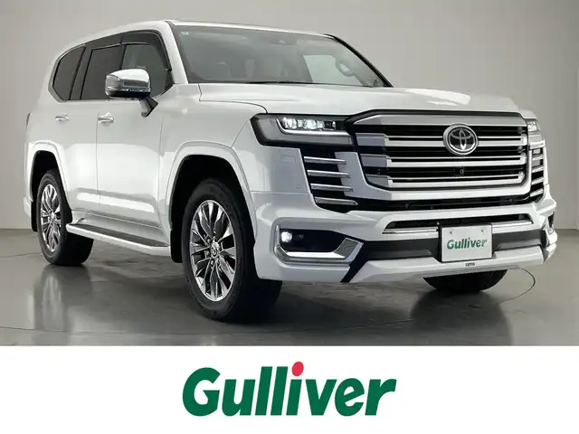 トヨタ ランドクルーザー ZX 愛知県 2024(令6)年 0.1千km プレシャスホワイトパール 純正１２．３型ナビ　ムーンルーフ　モデリスタ　禁煙　ＪＢＬサウンド　ベージュ革　全方位カメラ　シートヒーター　ハンドルヒーター　ハンズフリー電動リアゲート　衝突軽減　追従クルコン　ＢＳＭ　ＨＵＤ　コーナーセンサー　サイドステップ　スマートエントリーシステム　マルチテレーンモニター　　プリクラッシュセーフティ　Tコネクトナビシステムオプション　TVキャンセラー