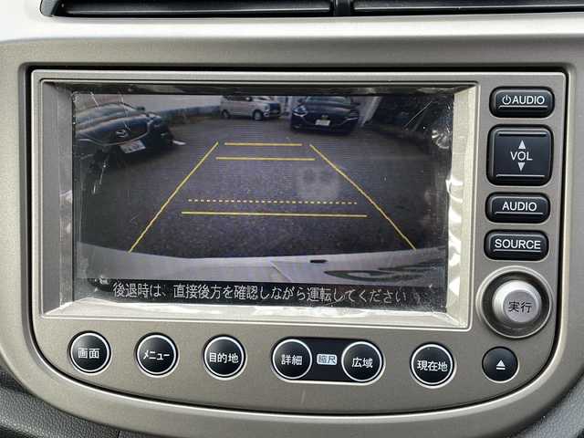 ホンダ フィット ハイブリット ナビ プレミアムセレクション 山口県 2010(平22)年 9.2万km プレミアムホワイトパール 純正ナビ/DVD/CD/MSV/ワンセグTV/バックカメラ/純正HIDヘッドライト/オートライト/純正１５インチアルミホイール/革巻きステアリング/ステアリングスイッチ/パドルシフト/クルーズコントロール/前席シートヒーター/横滑り防止/スマートキー/ビルトインETC/純正フロアマット/純正ドアバイザー/電動格納ウインカードアミラー