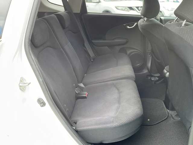 ホンダ フィット ハイブリット ナビ プレミアムセレクション 山口県 2010(平22)年 9.2万km プレミアムホワイトパール 純正ナビ/DVD/CD/MSV/ワンセグTV/バックカメラ/純正HIDヘッドライト/オートライト/純正１５インチアルミホイール/革巻きステアリング/ステアリングスイッチ/パドルシフト/クルーズコントロール/前席シートヒーター/横滑り防止/スマートキー/ビルトインETC/純正フロアマット/純正ドアバイザー/電動格納ウインカードアミラー