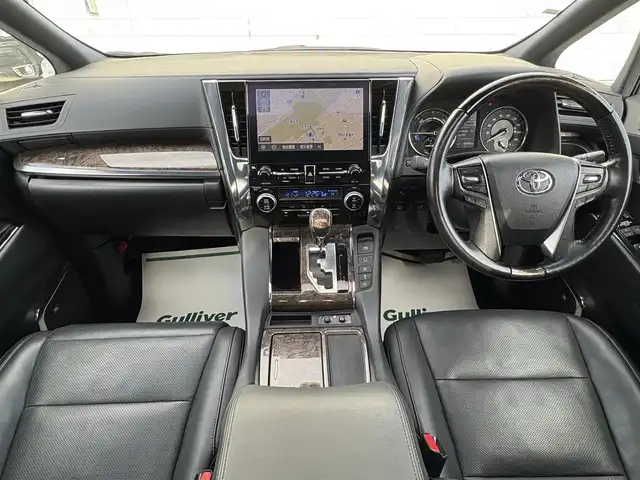 トヨタ アルファードハイブリット エグゼクティブ ラウンジ S 岩手県 2021(令3)年 5万km ホワイトパールクリスタルシャイン 禁煙車/4WD/モデリスタフルエアロ/モデリスタマフラー/ツインサンルーフ/LBLプレミアムサウンドシステム/ブラックレザーシート/純正フリップダウンモニター/全方位カメラ/パワーバックドア/AC100V電源/パワーシート/シートヒーター/エアシート/ハンドルヒーター/メーカーナビ/→フルセグTV/Bluetooth/CD/DVD/FM/AM/バックカメラ/ステアリングスイッチ/ブラインドスポットモニター/追従型クルーズコントロール/レーンキープアシスト/クリアランスソナー/パーキングサポートブレーキ/衝突軽減システム/リアクロストラフィックアラート/ロードアシストサイン/オートライト/オートハイビーム/LEDヘッドライト/LEDフォグライト/〇プッシュスタート/〇電動格納ミラー/〇ウィンカーミラー/〇ドアバイザー/〇フロアマット/〇USBポート/〇シガーソケット/〇スマートキー/前後ドライブレコーダー/ビルトインETC/オットマン