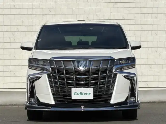 トヨタ アルファードハイブリット エグゼクティブ ラウンジ S 岩手県 2021(令3)年 5万km ホワイトパールクリスタルシャイン 禁煙車/4WD/モデリスタフルエアロ/モデリスタマフラー/ツインサンルーフ/LBLプレミアムサウンドシステム/ブラックレザーシート/純正フリップダウンモニター/全方位カメラ/パワーバックドア/AC100V電源/パワーシート/シートヒーター/エアシート/ハンドルヒーター/メーカーナビ/→フルセグTV/Bluetooth/CD/DVD/FM/AM/バックカメラ/ステアリングスイッチ/ブラインドスポットモニター/追従型クルーズコントロール/レーンキープアシスト/クリアランスソナー/パーキングサポートブレーキ/衝突軽減システム/リアクロストラフィックアラート/ロードアシストサイン/オートライト/オートハイビーム/LEDヘッドライト/LEDフォグライト/〇プッシュスタート/〇電動格納ミラー/〇ウィンカーミラー/〇ドアバイザー/〇フロアマット/〇USBポート/〇シガーソケット/〇スマートキー/前後ドライブレコーダー/ビルトインETC/オットマン