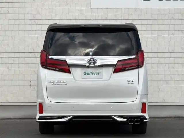 トヨタ アルファードハイブリット エグゼクティブ ラウンジ S 岩手県 2021(令3)年 5万km ホワイトパールクリスタルシャイン 禁煙車/4WD/モデリスタフルエアロ/モデリスタマフラー/ツインサンルーフ/LBLプレミアムサウンドシステム/ブラックレザーシート/純正フリップダウンモニター/全方位カメラ/パワーバックドア/AC100V電源/パワーシート/シートヒーター/エアシート/ハンドルヒーター/メーカーナビ/→フルセグTV/Bluetooth/CD/DVD/FM/AM/バックカメラ/ステアリングスイッチ/ブラインドスポットモニター/追従型クルーズコントロール/レーンキープアシスト/クリアランスソナー/パーキングサポートブレーキ/衝突軽減システム/リアクロストラフィックアラート/ロードアシストサイン/オートライト/オートハイビーム/LEDヘッドライト/LEDフォグライト/〇プッシュスタート/〇電動格納ミラー/〇ウィンカーミラー/〇ドアバイザー/〇フロアマット/〇USBポート/〇シガーソケット/〇スマートキー/前後ドライブレコーダー/ビルトインETC/オットマン