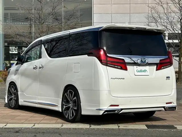 トヨタ アルファードハイブリット S 福島県 2018(平30)年 8.8万km ホワイトパールクリスタルシャイン Toyota Safety Sense/レーダークルーズコントロール/純正ナビゲーション/【フルセグTV/FM・AM/BT】/後席社外モニター/両側パワースライドドア/デジタルインナーミラー/モデリスタエアロ/ビルトインETC/バックカメラ/コーナーセンサー/前後ドライブレコーダー/オートLEDヘッドライト/オートハイビーム/レーンキープアシスト/横滑り防止/革巻きステアリング/ステアリングスイッチ/プッシュスタート/スマートキー