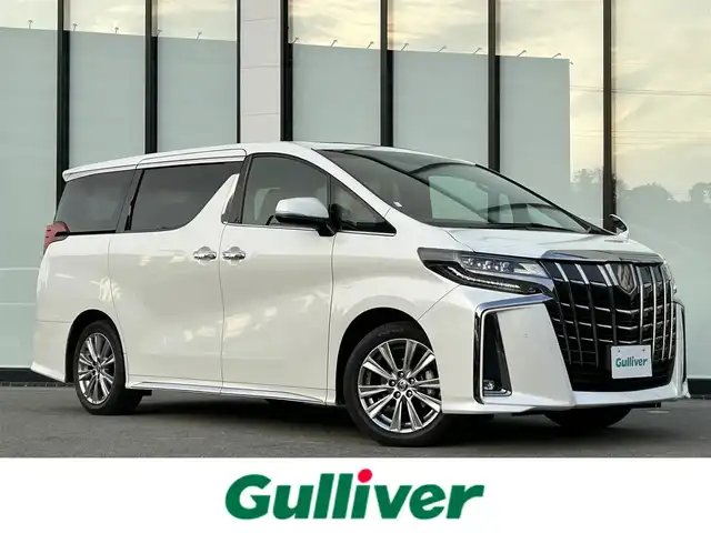トヨタ アルファード S タイプゴールド 大阪府 2021(令3)年 3.9万km ホワイトパールクリスタルシャイン ワンオーナー　/純正９インチナビ　/   フルセグＴＶ/CD/DVD/Bluetooth/USB　/バックモニター　/フリップダウンモニター　/ツインムーンルーフ/トヨタセーフティセンス/コーナーセンサー　　/両側パワースライドドア　/電動リアゲート　/オットマン/純正18インチアルミホイール　/ビルトインＥＴＣ2.0/三眼ＬＥＤ/取扱説明書/保証書/記録簿