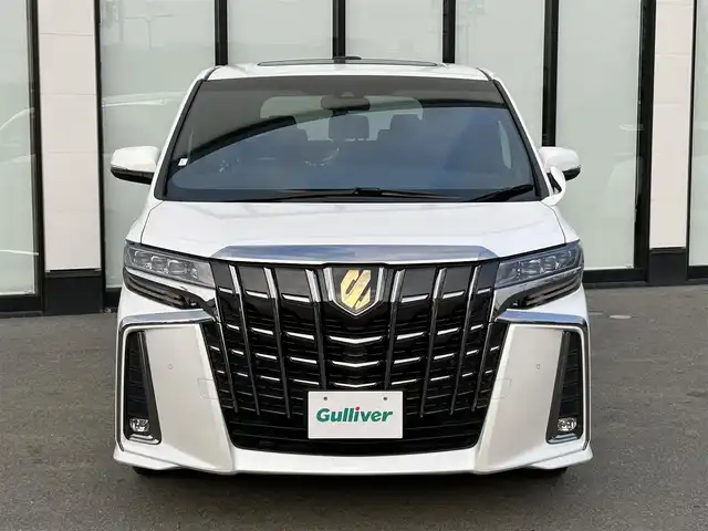 トヨタ アルファード S タイプゴールド 大阪府 2021(令3)年 3.9万km ホワイトパールクリスタルシャイン ワンオーナー　/純正９インチナビ　/   フルセグＴＶ/CD/DVD/Bluetooth/USB　/バックモニター　/フリップダウンモニター　/ツインムーンルーフ/トヨタセーフティセンス/コーナーセンサー　　/両側パワースライドドア　/電動リアゲート　/オットマン/純正18インチアルミホイール　/ビルトインＥＴＣ2.0/三眼ＬＥＤ/取扱説明書/保証書/記録簿