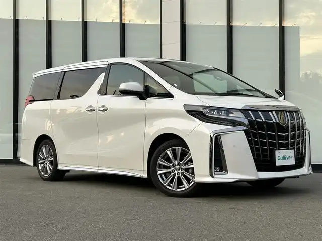 トヨタ アルファード S タイプゴールド 大阪府 2021(令3)年 3.9万km ホワイトパールクリスタルシャイン ワンオーナー　/純正９インチナビ　/   フルセグＴＶ/CD/DVD/Bluetooth/USB　/バックモニター　/フリップダウンモニター　/ツインムーンルーフ/トヨタセーフティセンス/コーナーセンサー　　/両側パワースライドドア　/電動リアゲート　/オットマン/純正18インチアルミホイール　/ビルトインＥＴＣ2.0/三眼ＬＥＤ/取扱説明書/保証書/記録簿